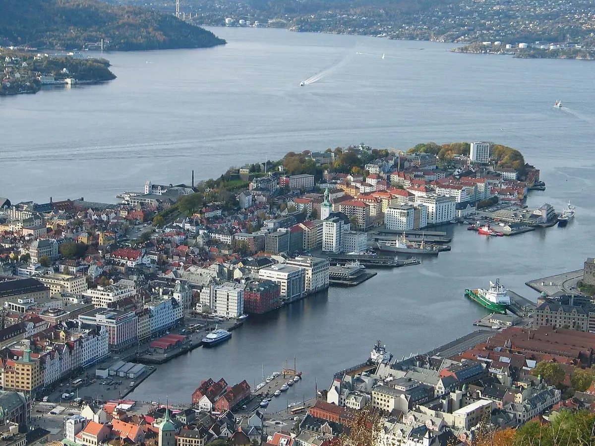 Aerial view over Bergen's compact harbour, the Bryggen wharf and the surrounding fjord.